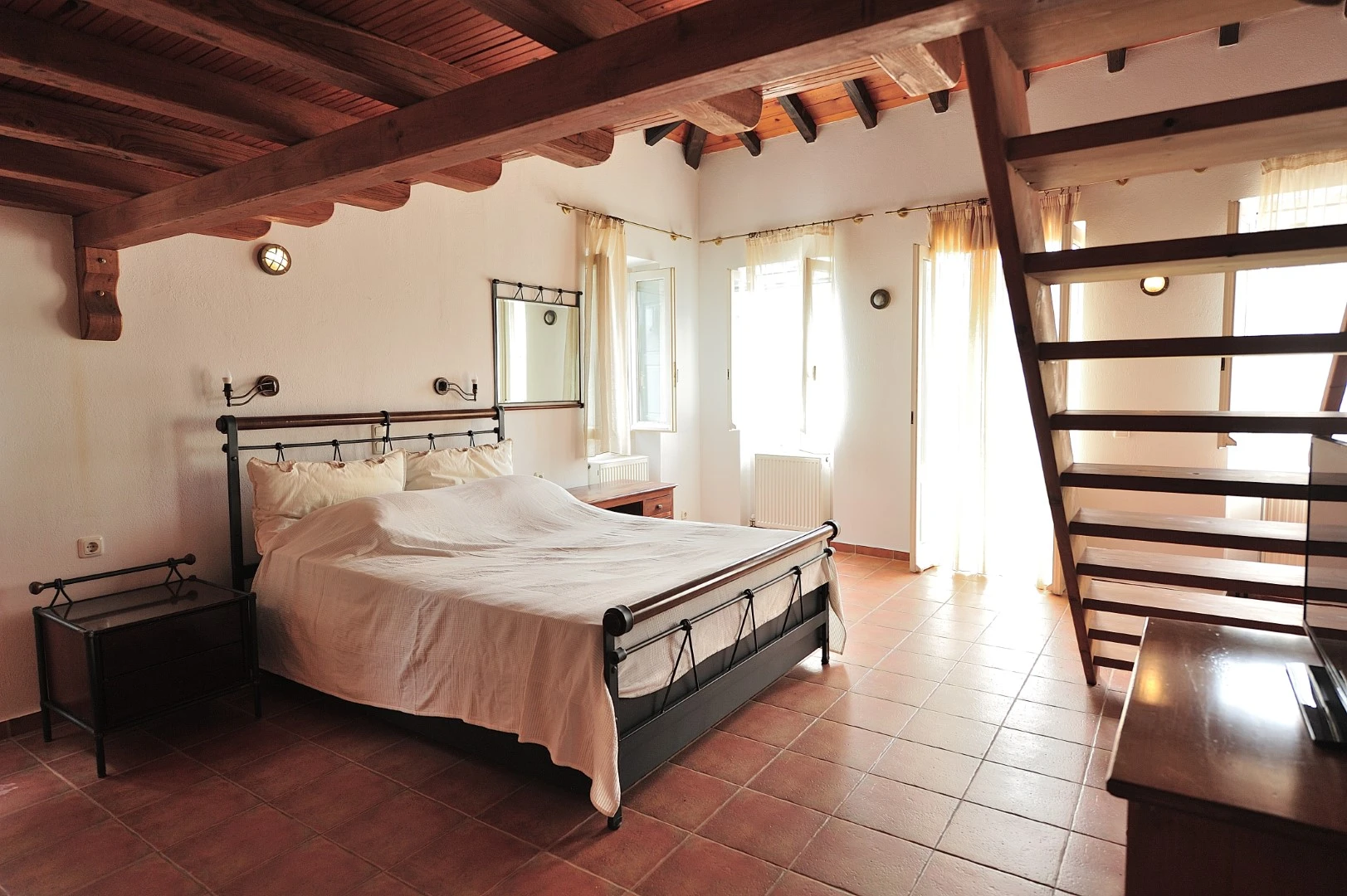 Choose between two stunning Skiathos locations: vibrant Skiathos Town at Orestis Mansion or the peaceful seaside setting of Orestis Suites in Kolios, designed to create a cosy and unforgettable Greek island escape.